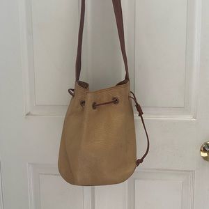 Vintage Il Bisonte bucket bag in cream and tan.